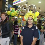 Cassie sporting the green and yellow for Oz Lotto's $50 Million jackpot.